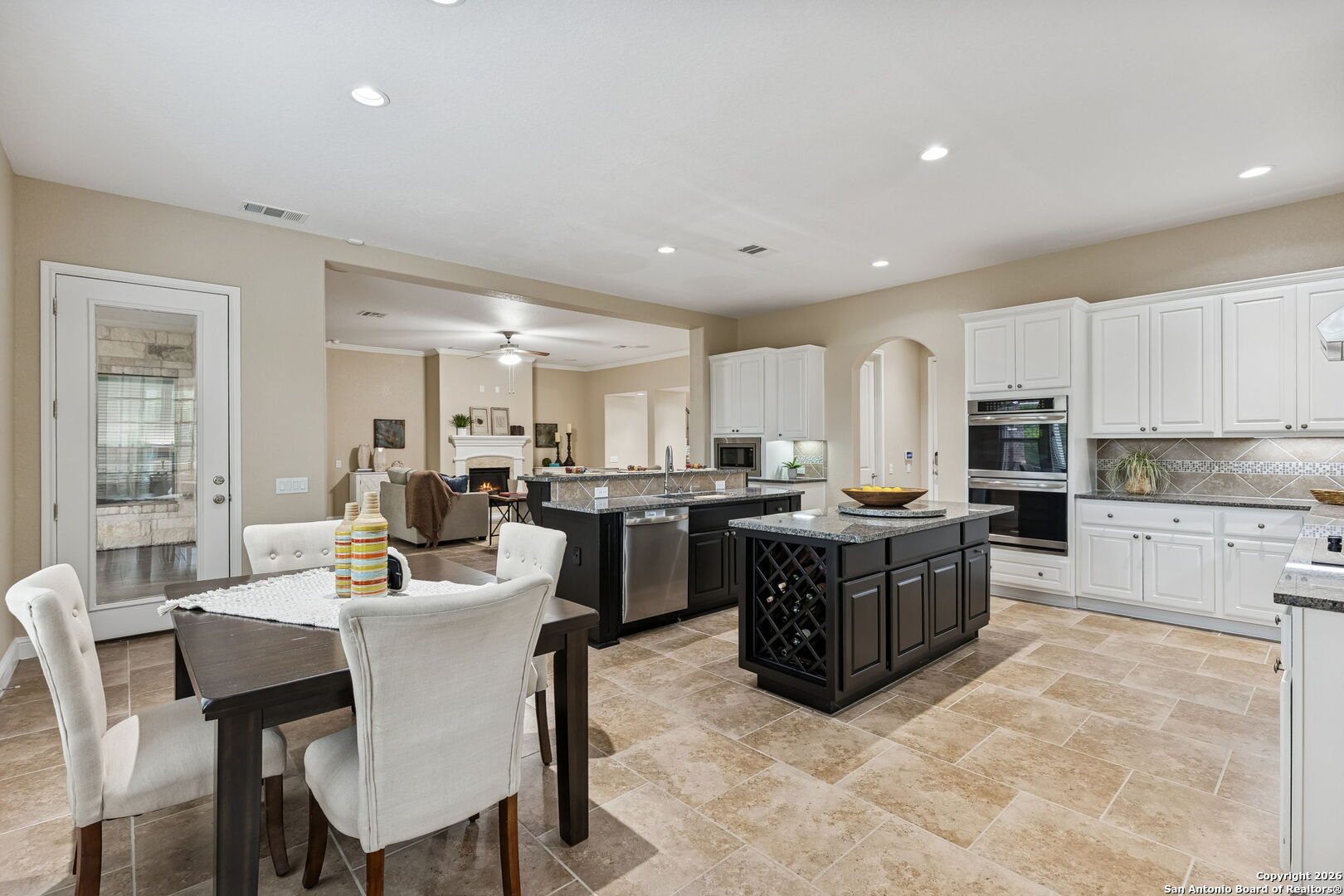 2194 Ranch Loop Drive New Braunfels, TX 78132 - Photo 14 of 52 a large kitchen with a table and chairs