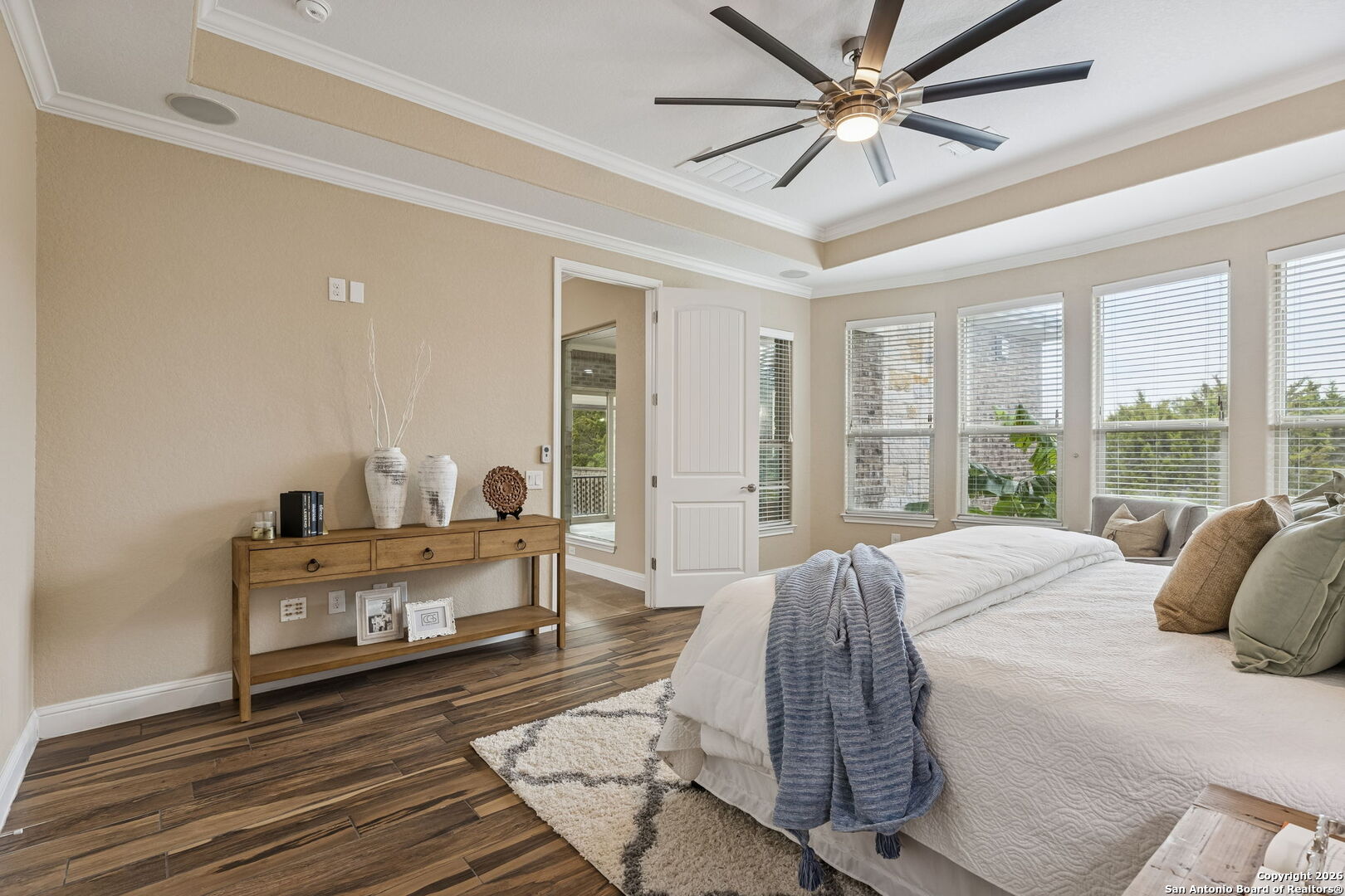 2194 Ranch Loop Drive New Braunfels, TX 78132 - Photo 21 of 52 a bedroom with a bed and large windows