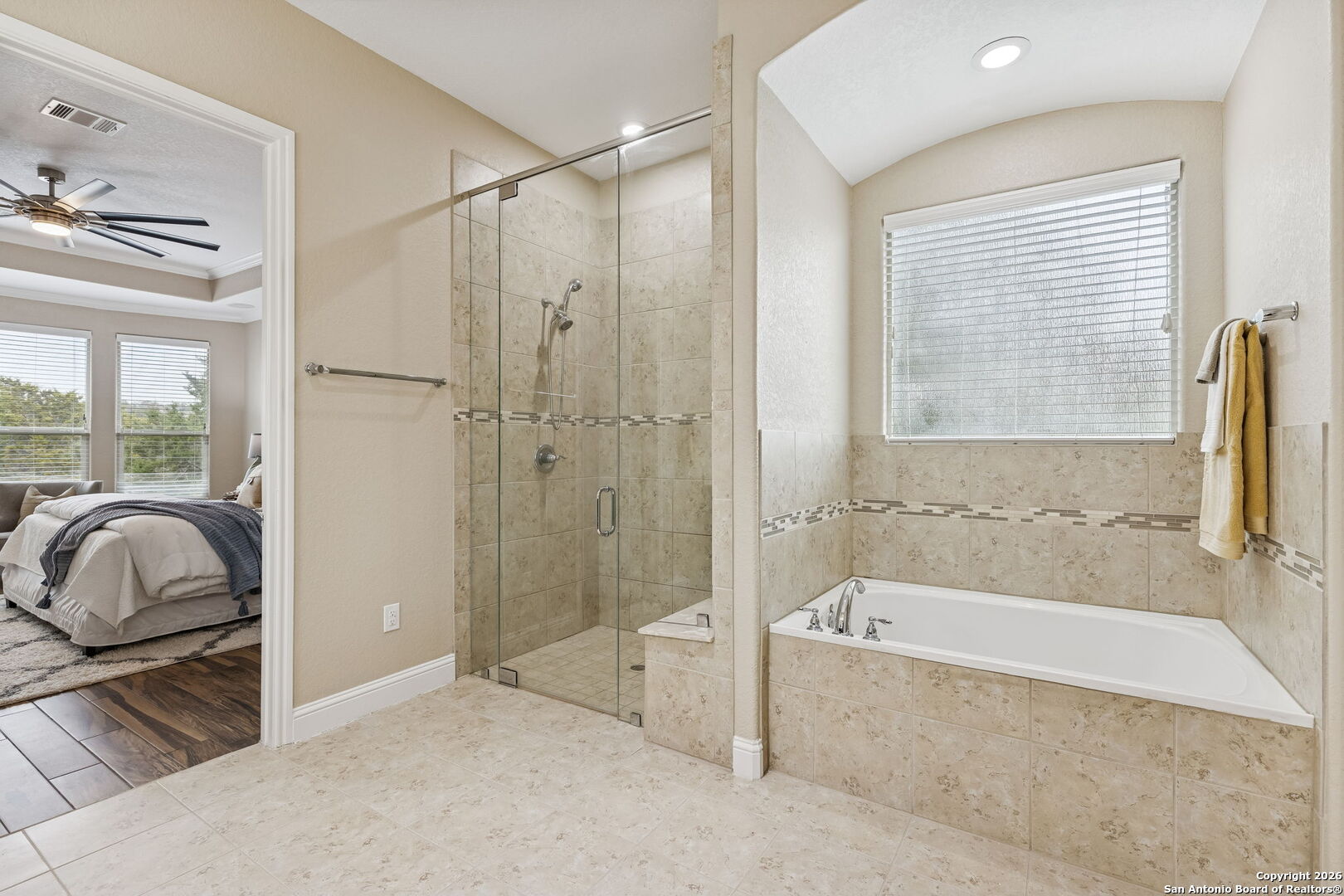 2194 Ranch Loop Drive New Braunfels, TX 78132 - Photo 23 of 52 a bathroom with a tub shower and a sink