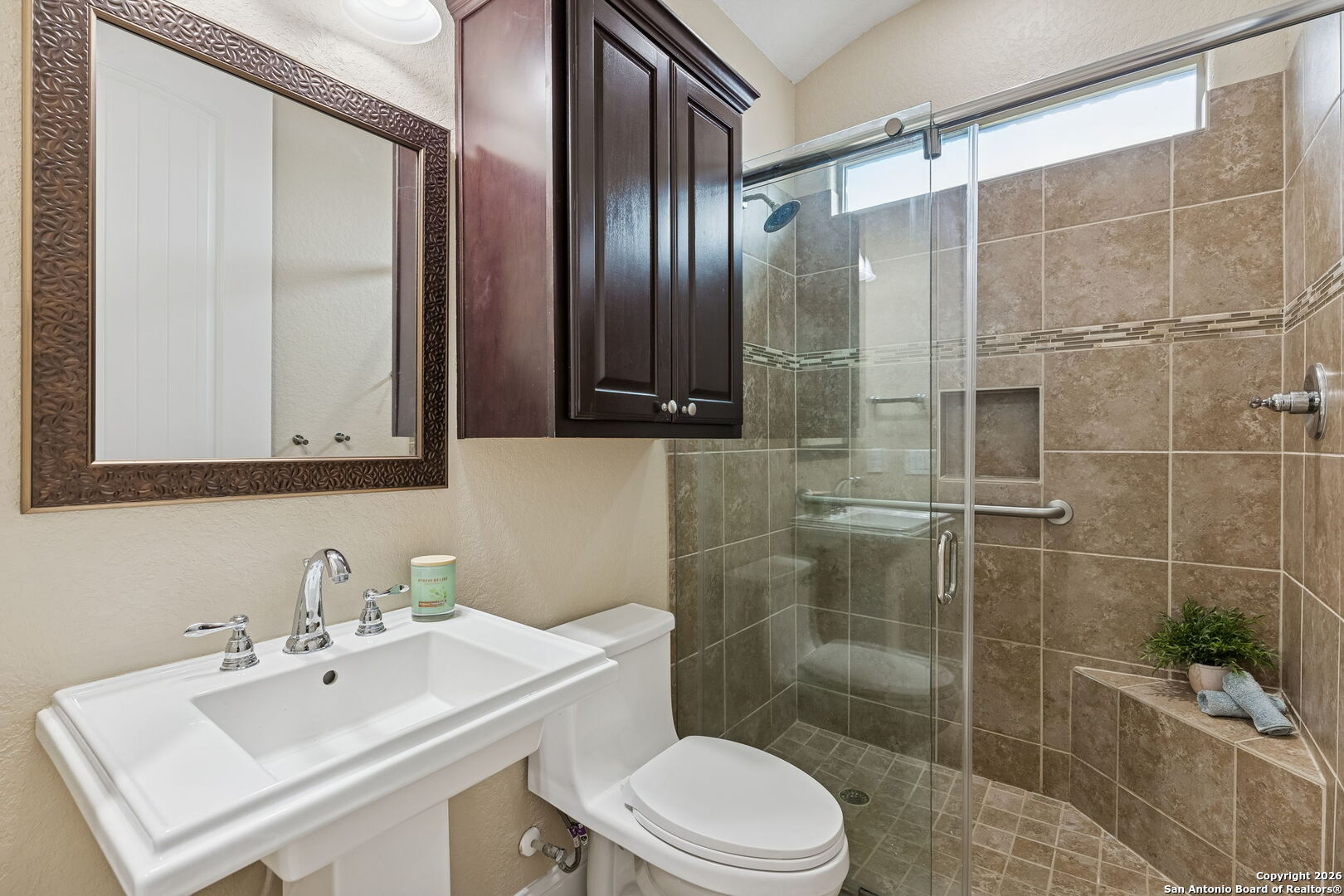 2194 Ranch Loop Drive New Braunfels, TX 78132 - Photo 28 of 52 a bathroom with a sink toilet and shower