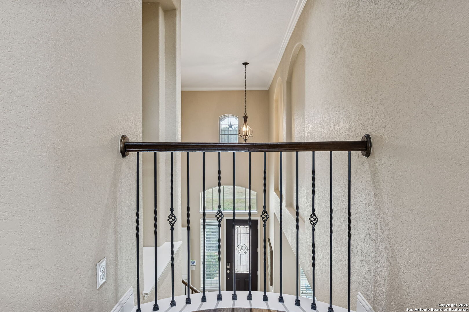 2194 Ranch Loop Drive New Braunfels, TX 78132 - Photo 36 of 52 a view of a hallway with wooden floor and staircase