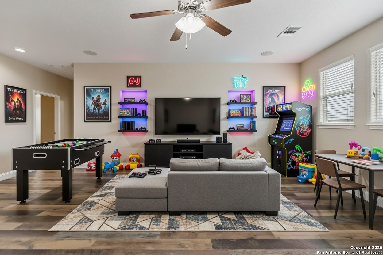2194 Ranch Loop Drive New Braunfels, TX 78132 - Photo 39 of 52 a living room with furniture and a flat screen tv