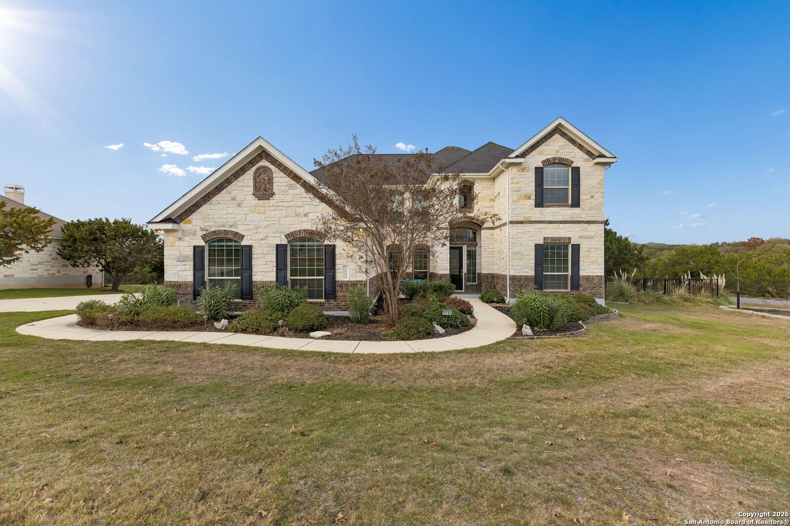 2194 Ranch Loop Drive New Braunfels, TX 78132 - Photo 4 of 52 a view of a house with a yard and garage