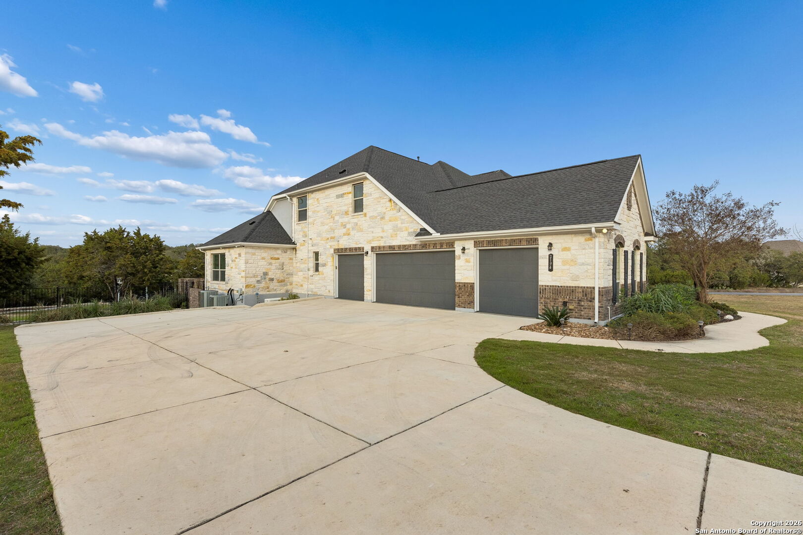 2194 Ranch Loop Drive New Braunfels, TX 78132 - Photo 48 of 52 a front view of a house with a yard