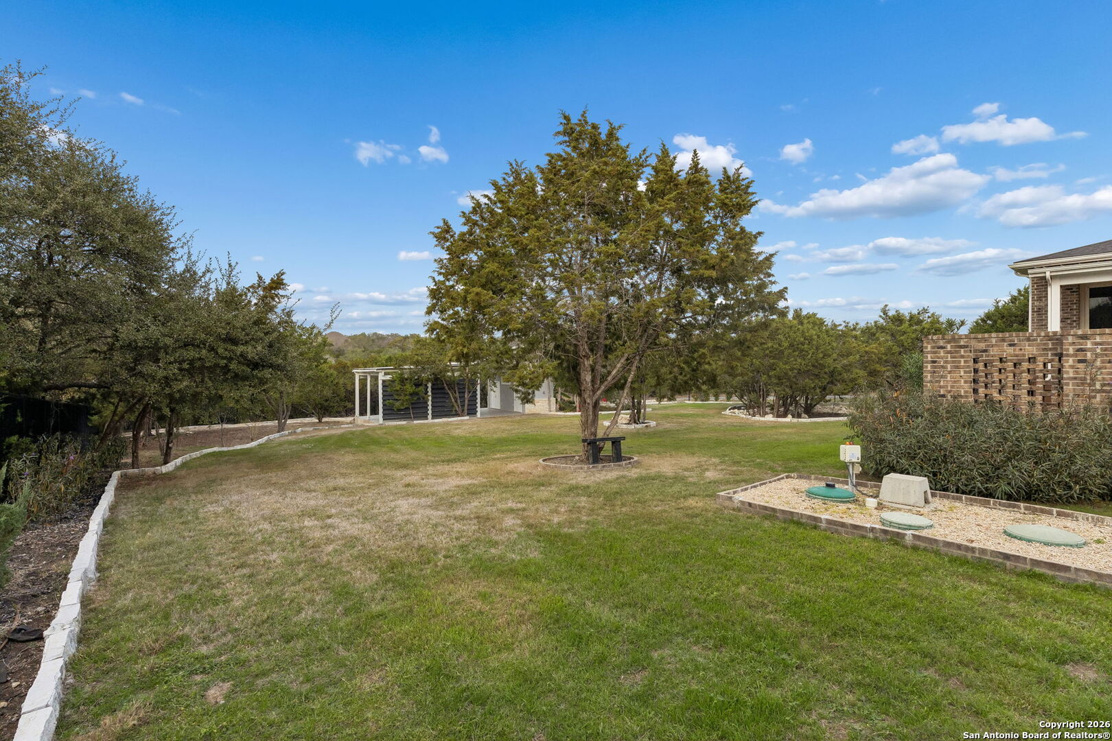 2194 Ranch Loop Drive New Braunfels, TX 78132 - Photo 51 of 52 a view of a house with a yard
