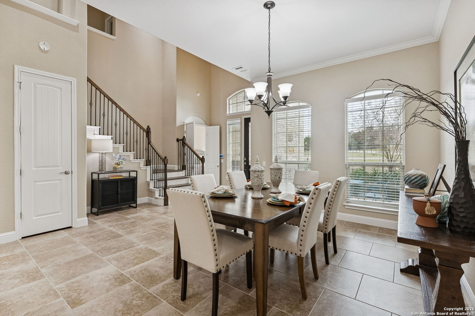 2194 Ranch Loop Drive New Braunfels, TX 78132 - Photo 8 of 52 a view of a dining room with furniture and a chandelier