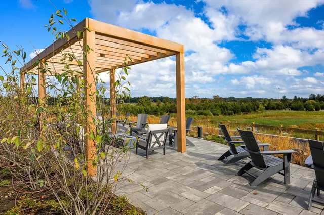 a view of a terrace with sitting area