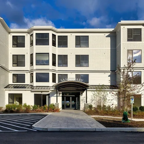 a building outdoor space with patio furniture