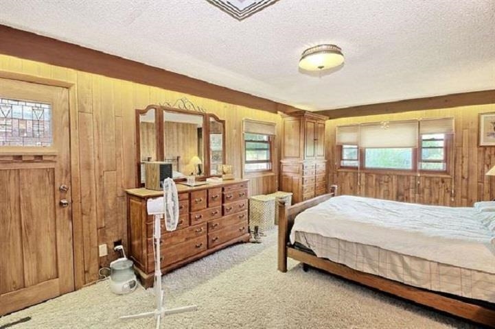 1024 24 Road Grand Junction, CO 81505 - Photo 23 of 42 a bedroom with a bed a window and walk in closet