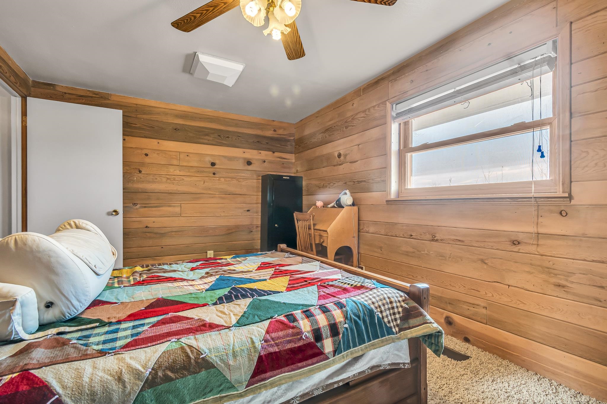 1024 24 Road Grand Junction, CO 81505 - Photo 25 of 42 a bedroom with a bed and a window