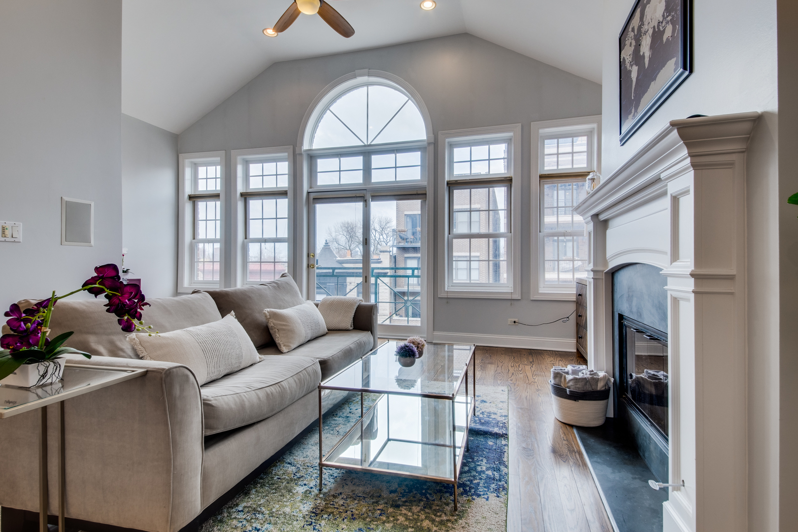 4146 North Lincoln Avenue, Unit 3 Chicago, IL 60618 - Photo 2 of 32 a living room with furniture garden view and a fireplace