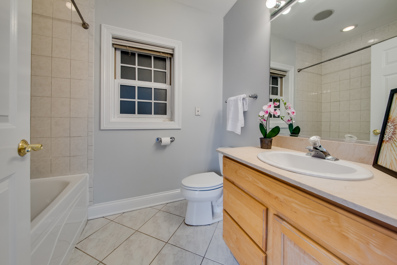 4146 North Lincoln Avenue, Unit 3 Chicago, IL 60618 - Photo 22 of 32 a bathroom with a sink toilet and shower