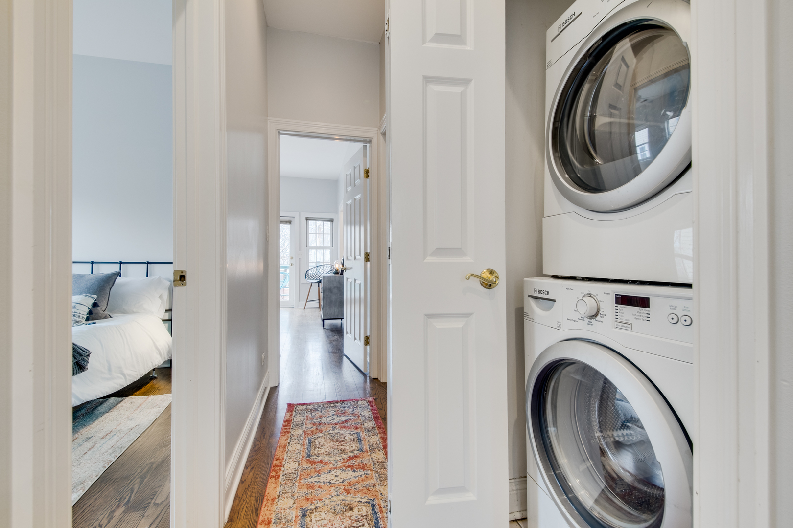 4146 North Lincoln Avenue, Unit 3 Chicago, IL 60618 - Photo 27 of 32 a view of a bedroom with washer and dryer