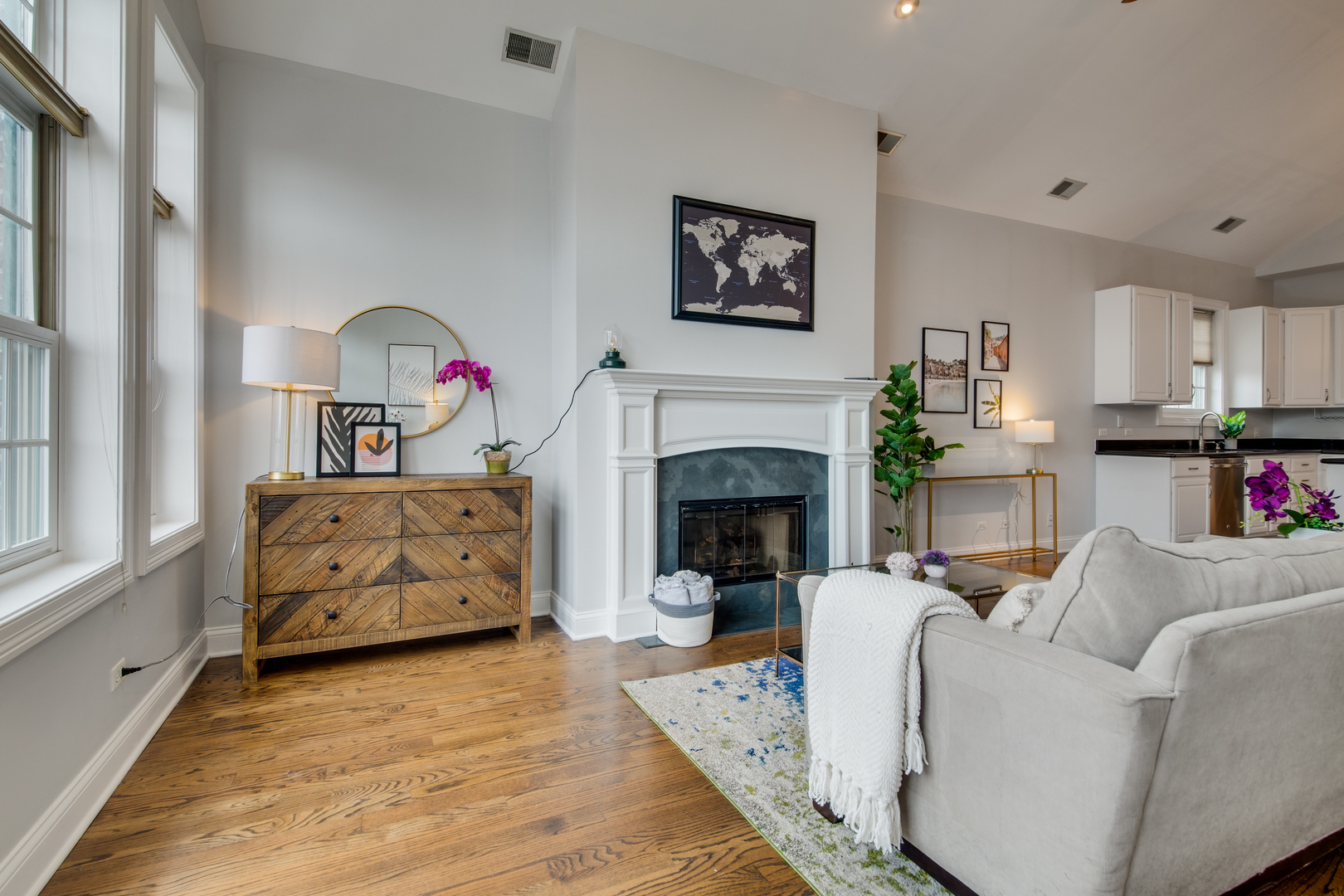 4146 North Lincoln Avenue, Unit 3 Chicago, IL 60618 - Photo 4 of 32 a living room with furniture and a fireplace
