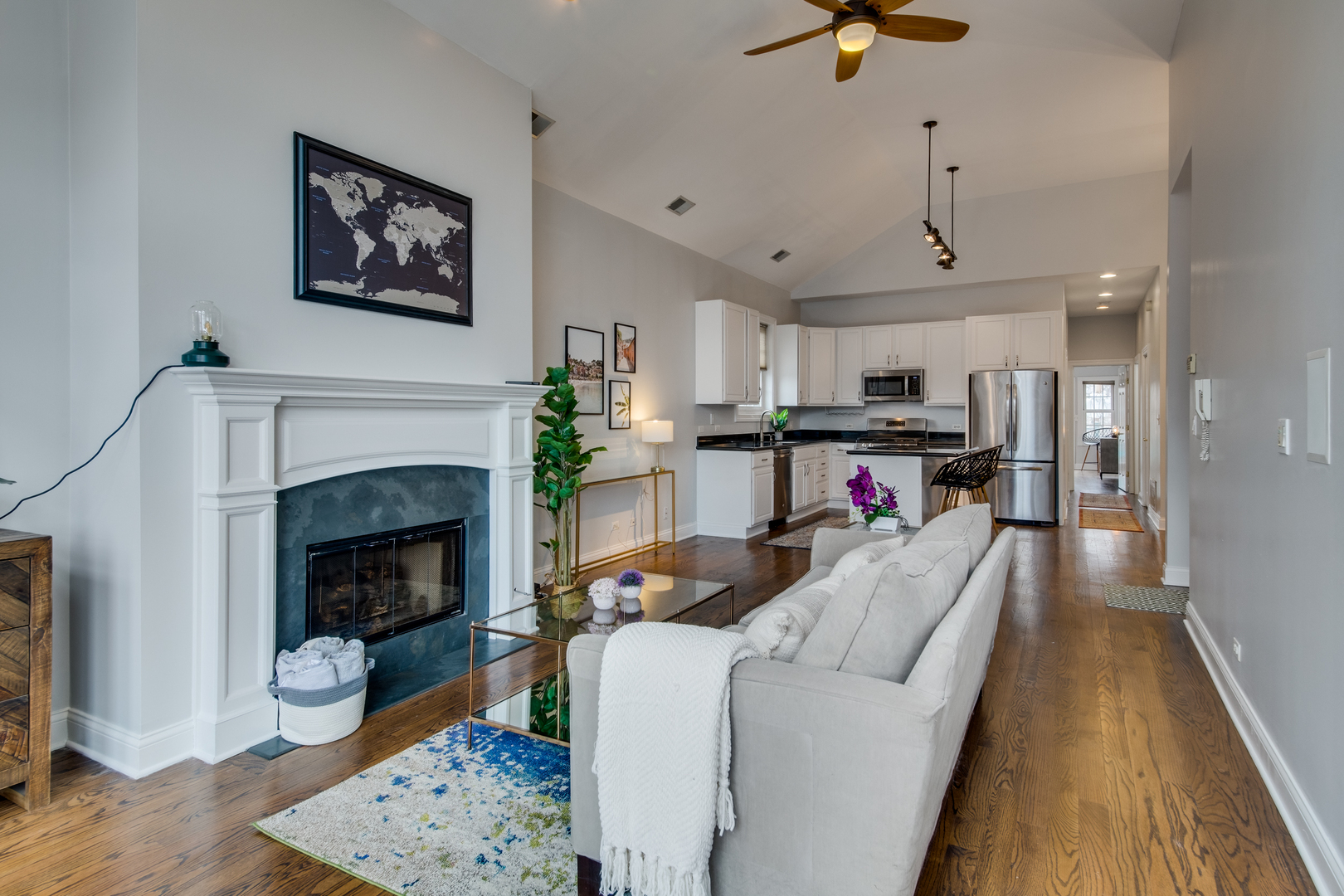 4146 North Lincoln Avenue, Unit 3 Chicago, IL 60618 - Photo 5 of 32 a living room with furniture and a fireplace
