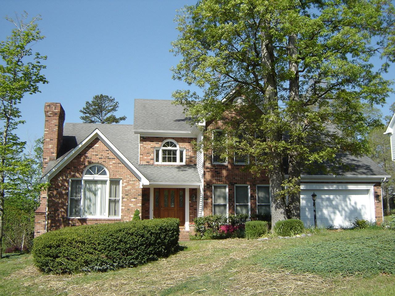 241 Stonehaven Lane Blue Ridge, VA 24064 - Photo 1 of 18 a front view of a house with garden