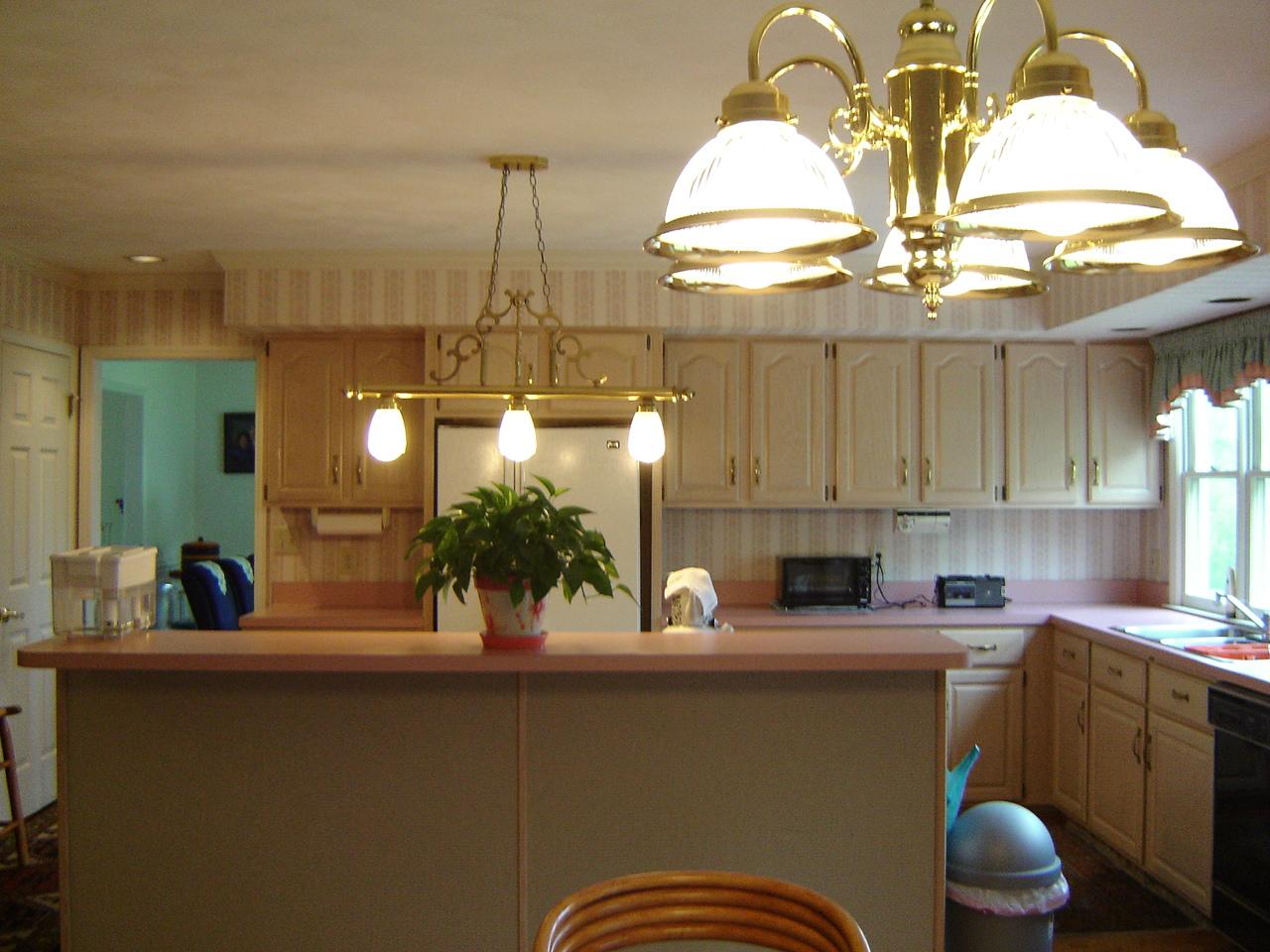 241 Stonehaven Lane Blue Ridge, VA 24064 - Photo 7 of 18 a kitchen with a sink and a potted plant