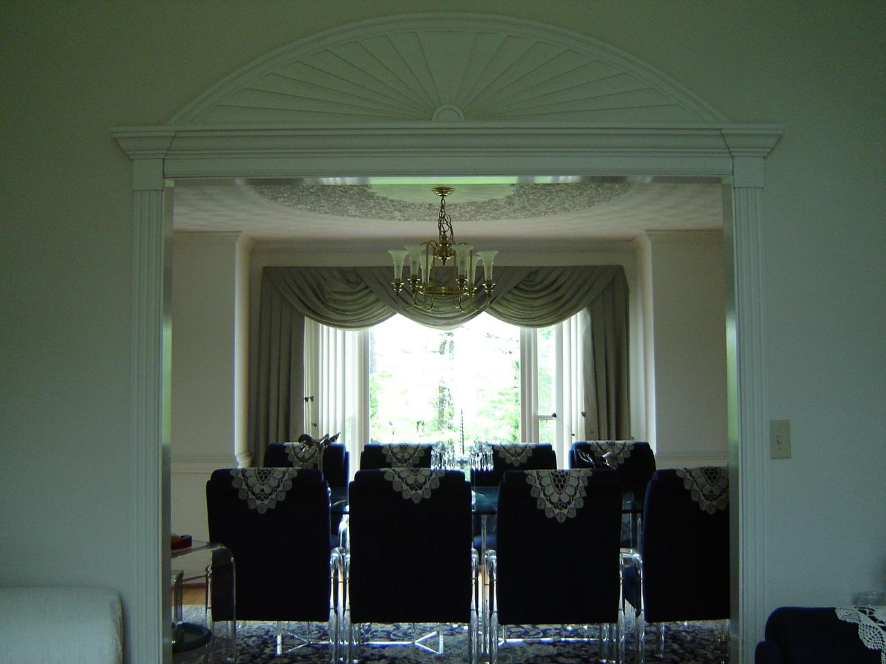241 Stonehaven Lane Blue Ridge, VA 24064 - Photo 10 of 18 a living room with furniture and a chandelier