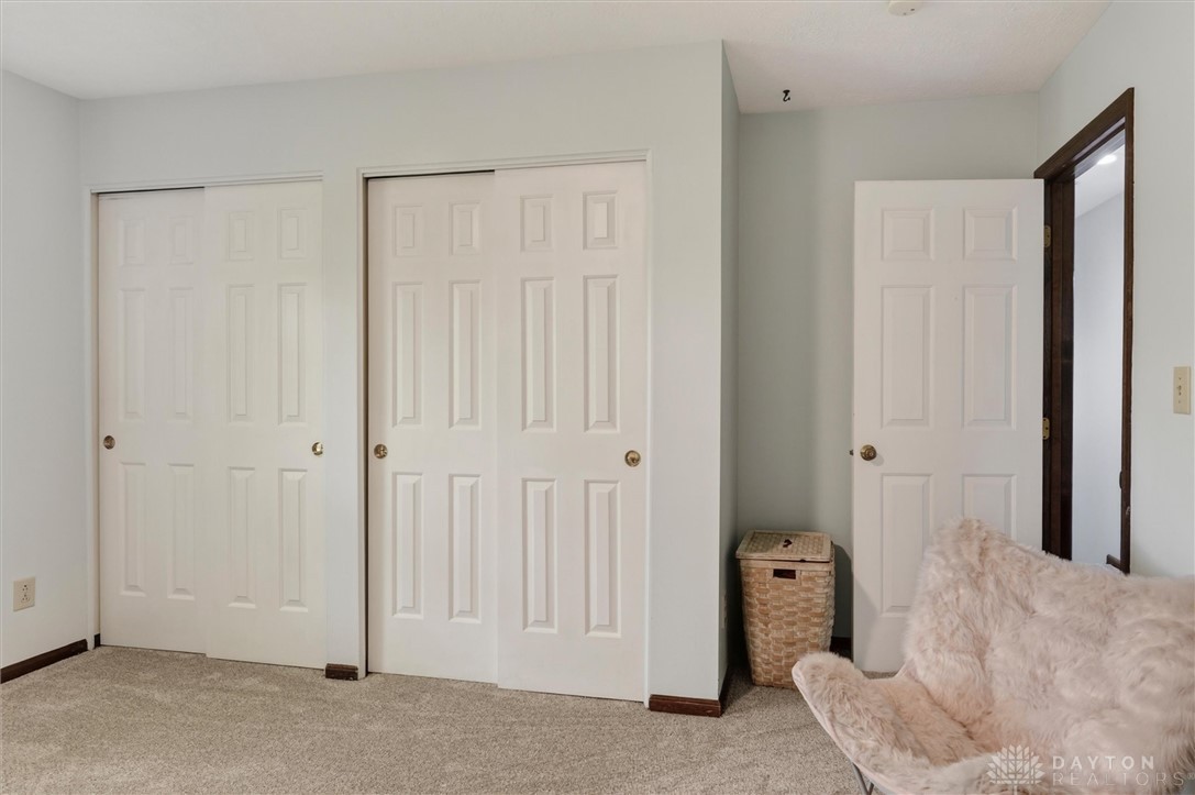 2165 Stewart Road Xenia, OH 45385 - Photo 32 of 59 This cozy bedroom offers ample storage solutions for comfortable living.