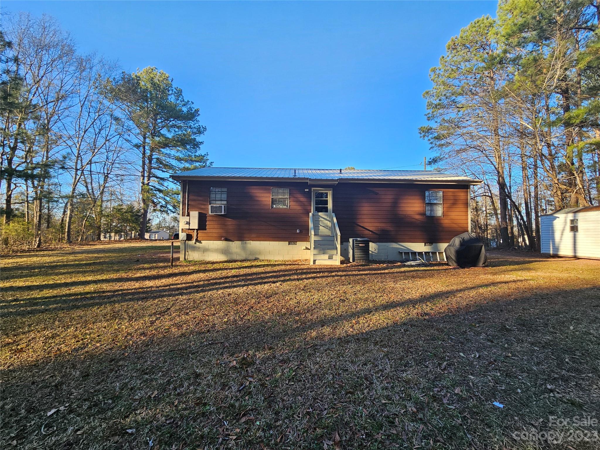5361 Crawford Road Fort Lawn, SC 29714 - Photo 15 of 15 a view of the house with yard and a garage