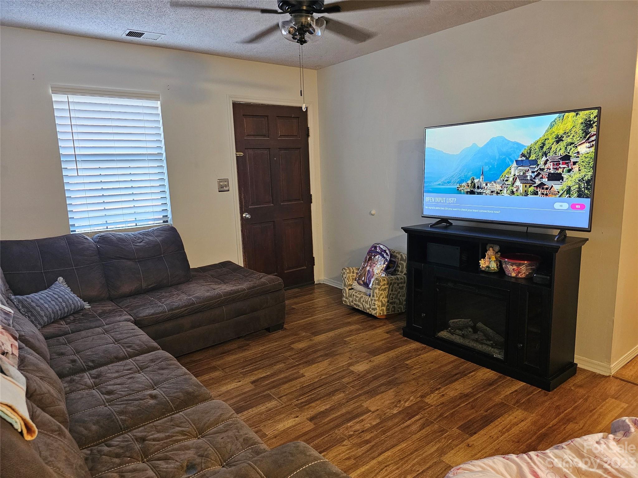 5361 Crawford Road Fort Lawn, SC 29714 - Photo 2 of 15 a living room with furniture and a fireplace