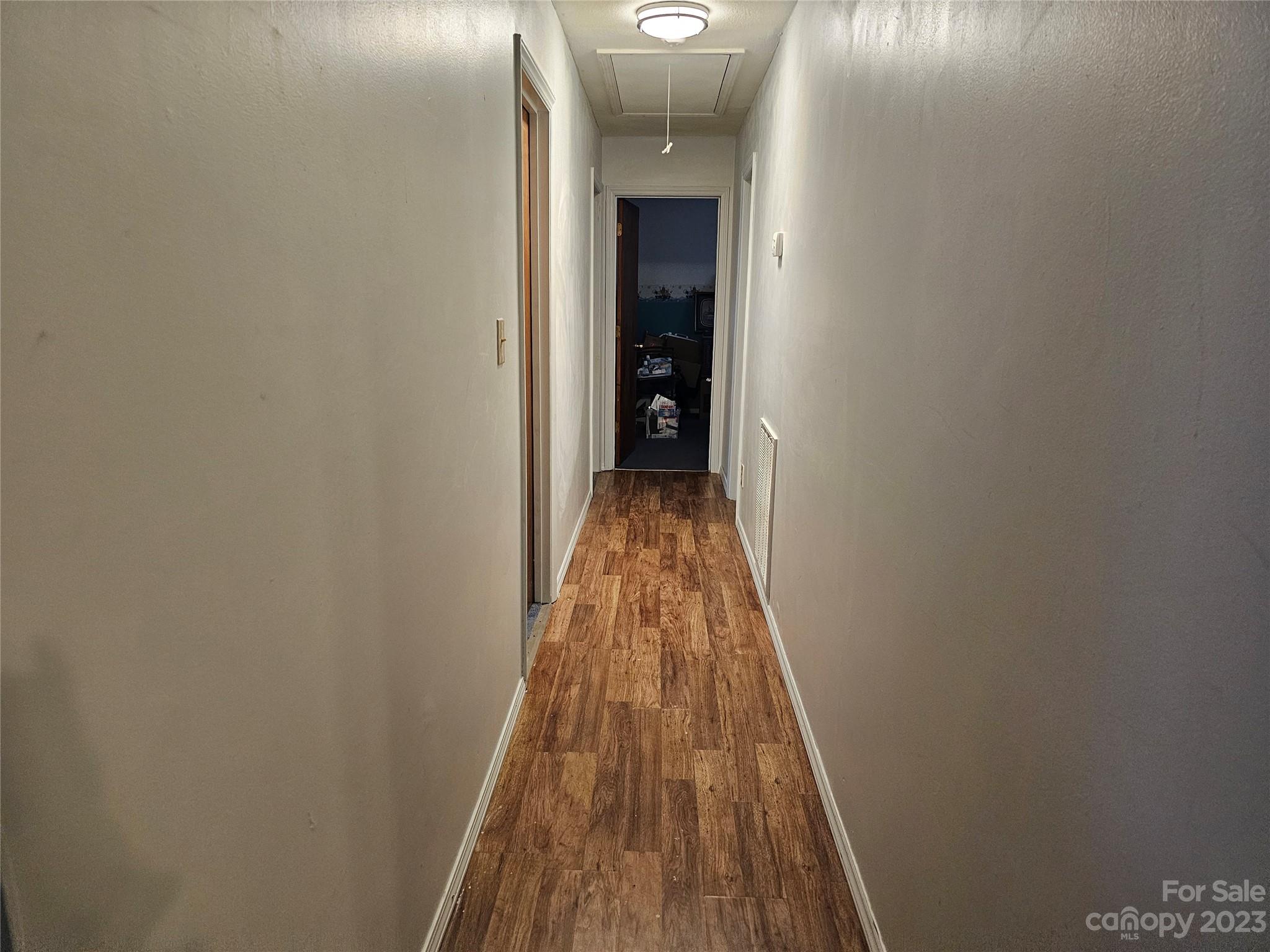 5361 Crawford Road Fort Lawn, SC 29714 - Photo 6 of 15 a view of a hallway with wooden floor