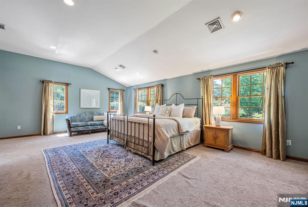 411 Snyder Road Wyckoff, NJ 07481 - Photo 17 of 36 a bed room with furniture and a window