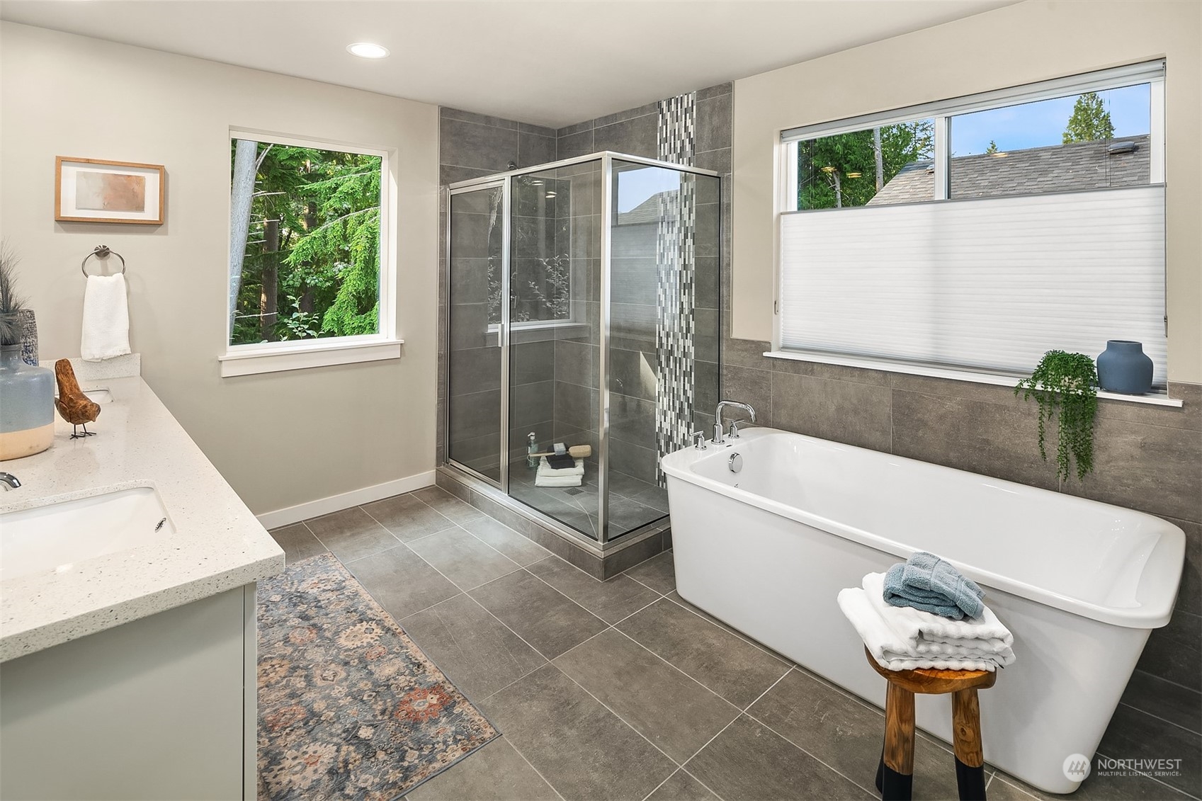 4126 230th Place Southeast Bothell, WA 98021 - Photo 17 of 33 a bathroom with a bathtub and a sink