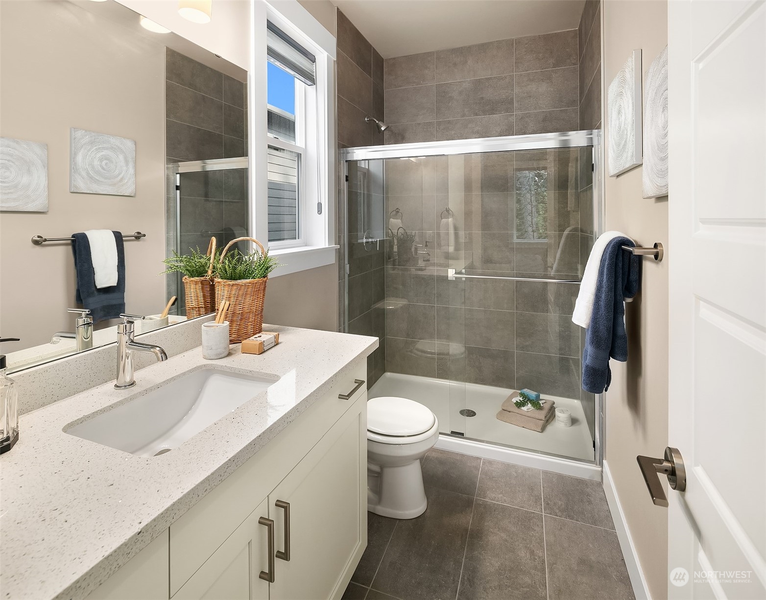 4126 230th Place Southeast Bothell, WA 98021 - Photo 21 of 33 a bathroom with a sink a toilet and shower