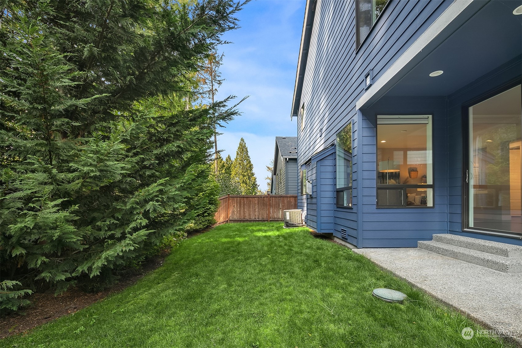 4126 230th Place Southeast Bothell, WA 98021 - Photo 28 of 33 a view of brick building next to a yard