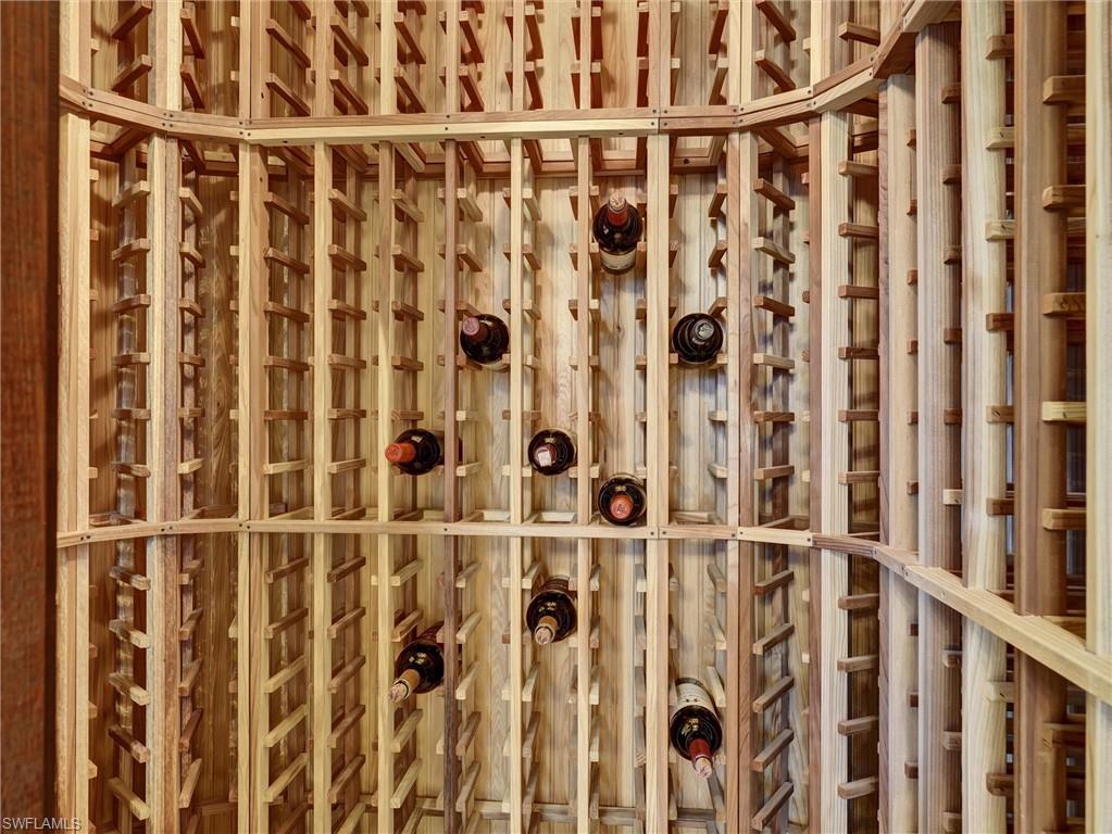 9113 Terrabella Court Naples, FL 34109 - Photo 12 of 47 a bathroom with a shower curtain