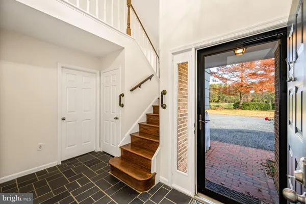 a view of an entryway with staircase