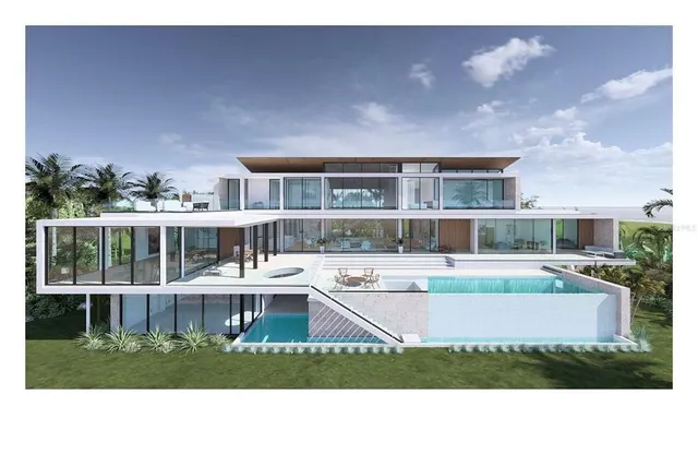 a house view with a seating space and a garden