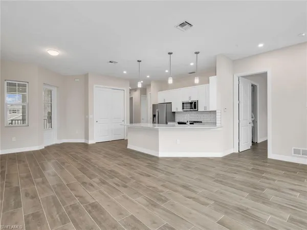 $2,499 | 268 Indies Drive East, Unit 201, Naples, FL 34114