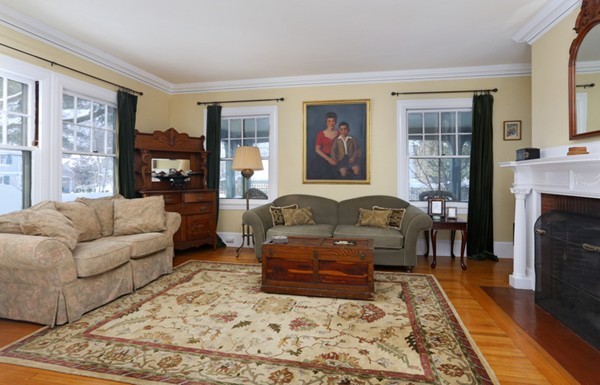 99 Pine Ridge Road Newton, MA 02468 - Photo 2 of 9 a living room with furniture and a fireplace