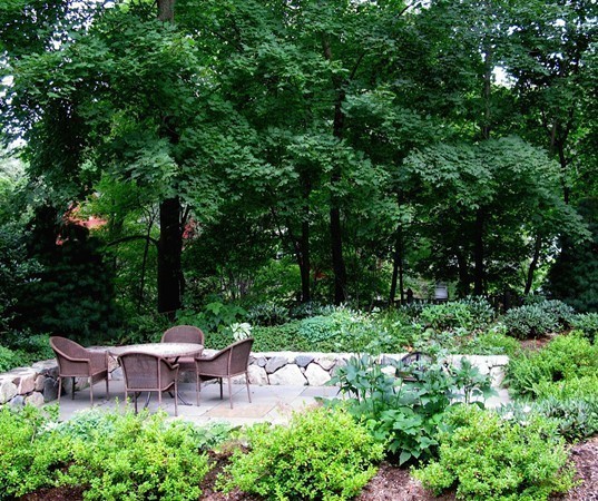 99 Pine Ridge Road Newton, MA 02468 - Photo 9 of 9 a view of a table and chairs in a garden