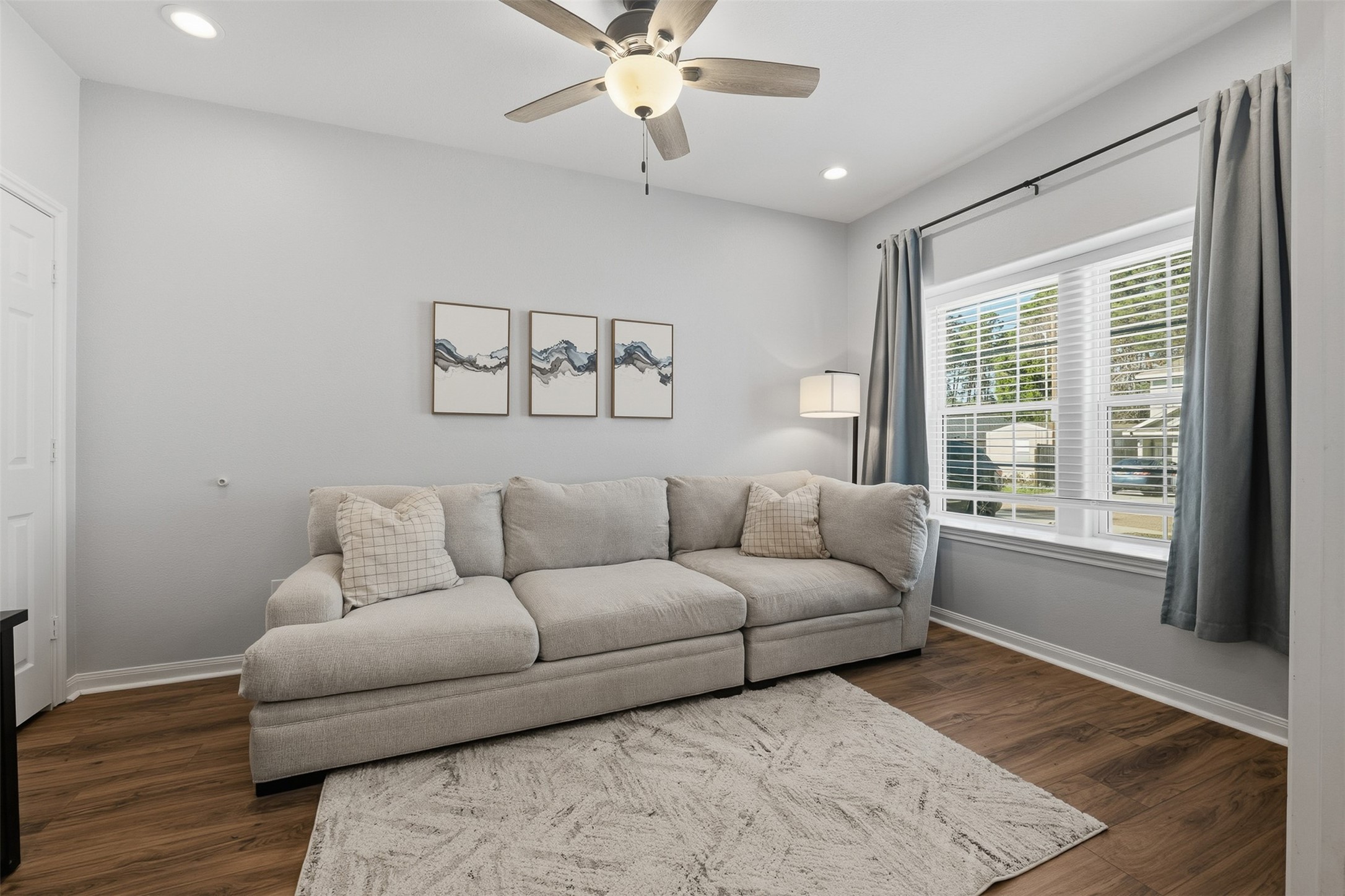 16879 Balmoral Street Montgomery, TX 77316 - Photo 1 of 25 a living room with furniture and a window