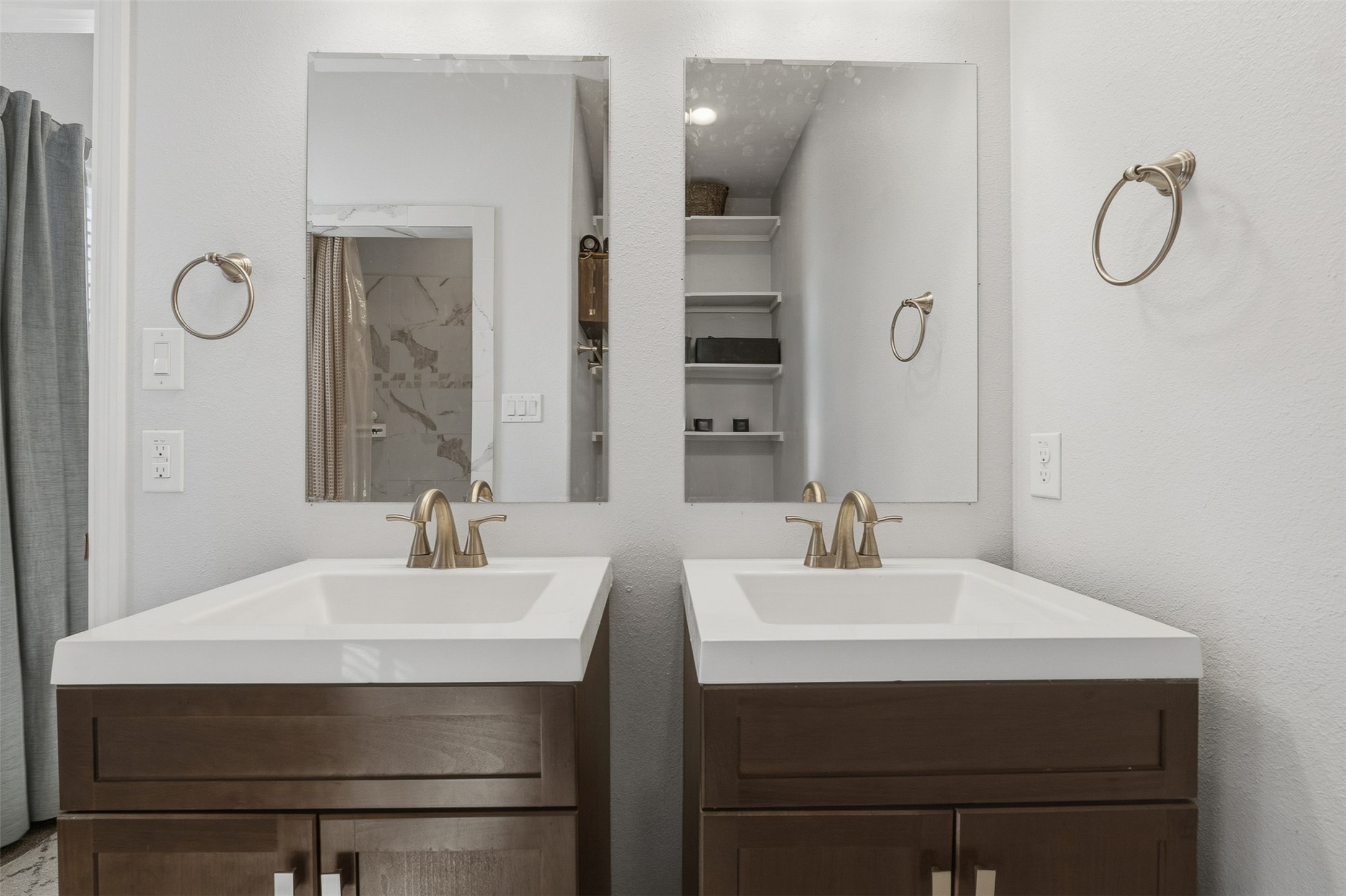 16879 Balmoral Street Montgomery, TX 77316 - Photo 19 of 25 Spa-inspired primary bathroom featuring a custom walk-in shower with niche shelving.