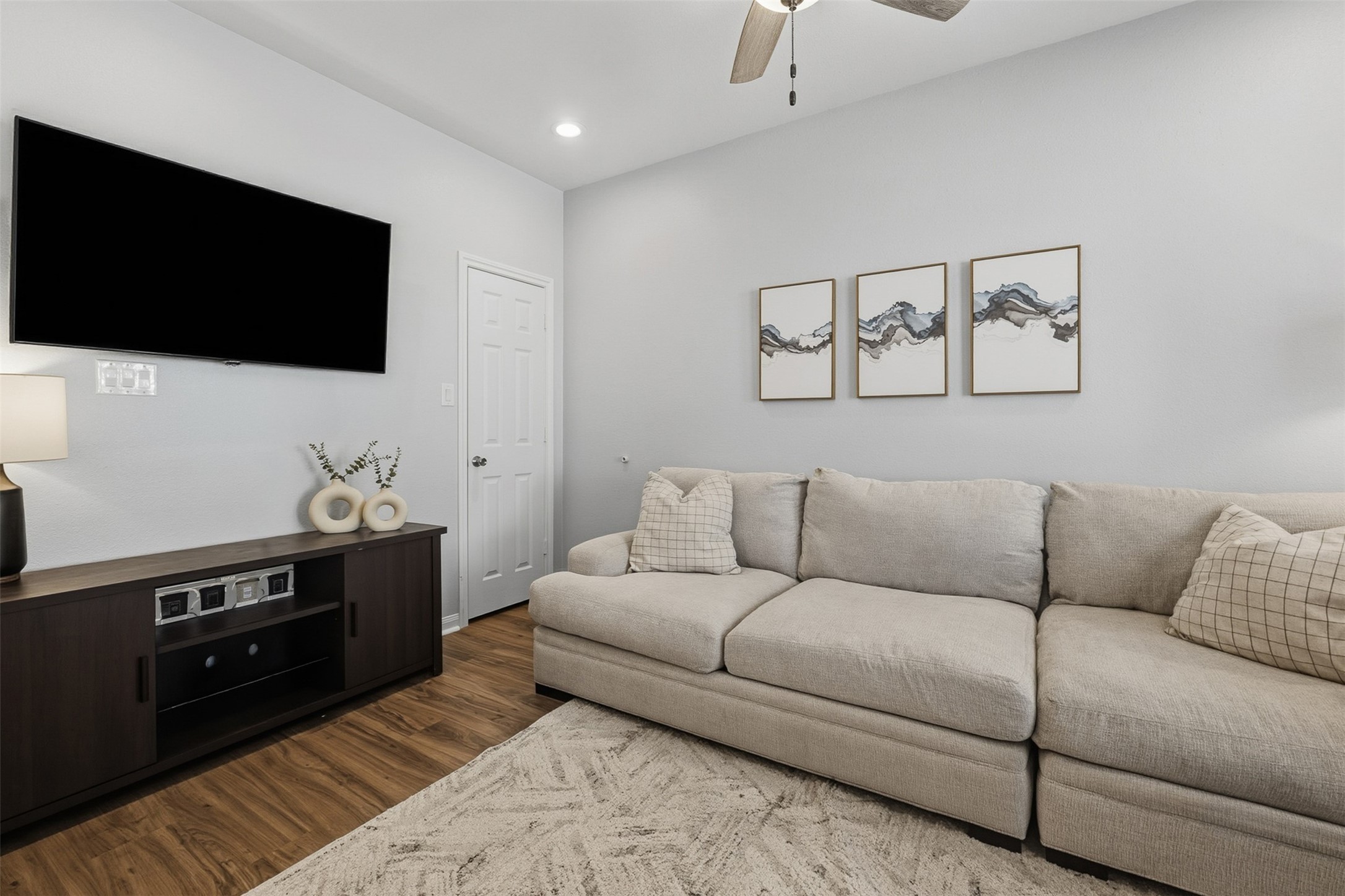 16879 Balmoral Street Montgomery, TX 77316 - Photo 4 of 25 Cozy yet spacious living room and convenient access to adjoining spaces.