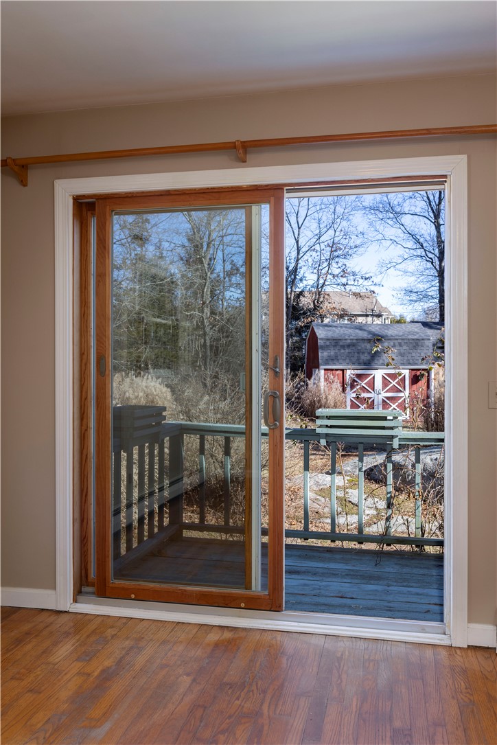 1037 Great Road Lincoln, RI 02865 - Photo 11 of 33 Sliders to small deck off bedroom