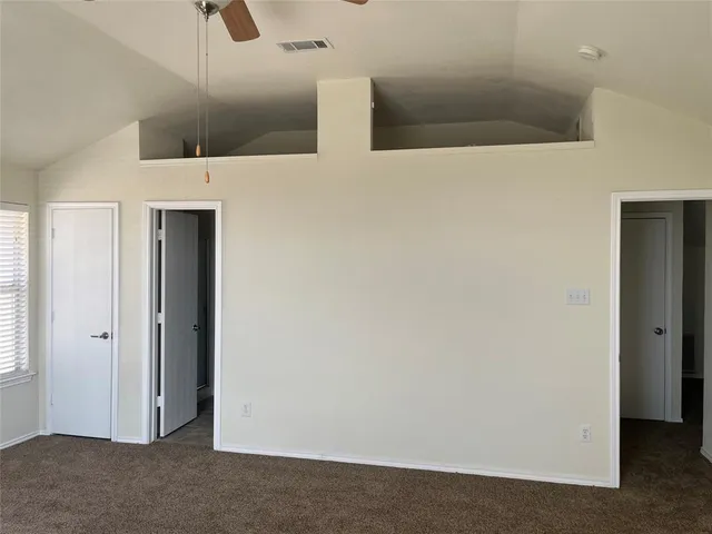 a bathroom with a tub and shower