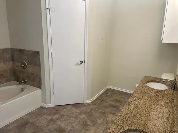 a bathroom with a bathtub