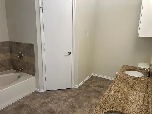 a bathroom with a bathtub