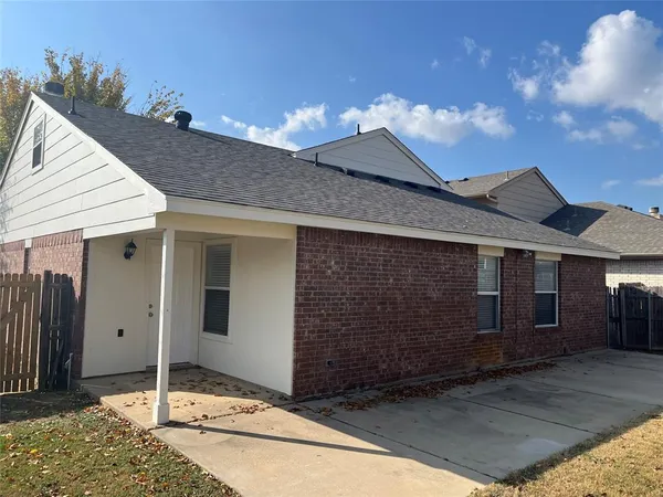 a view of a porch with wooden floor