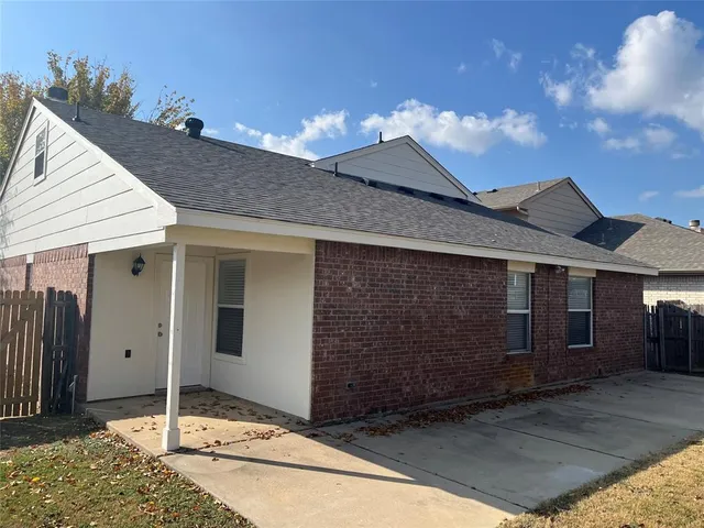 a view of a porch with wooden floor