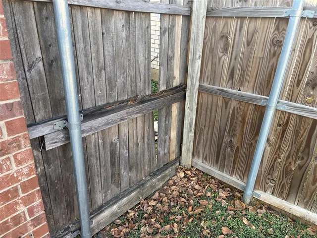 a view of swimming pool with a big yard