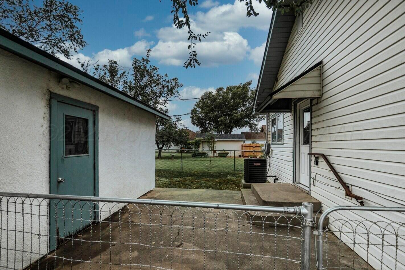 700 21st Street Canyon, TX 79015 - Photo 29 of 30 a view of a porch with a bench