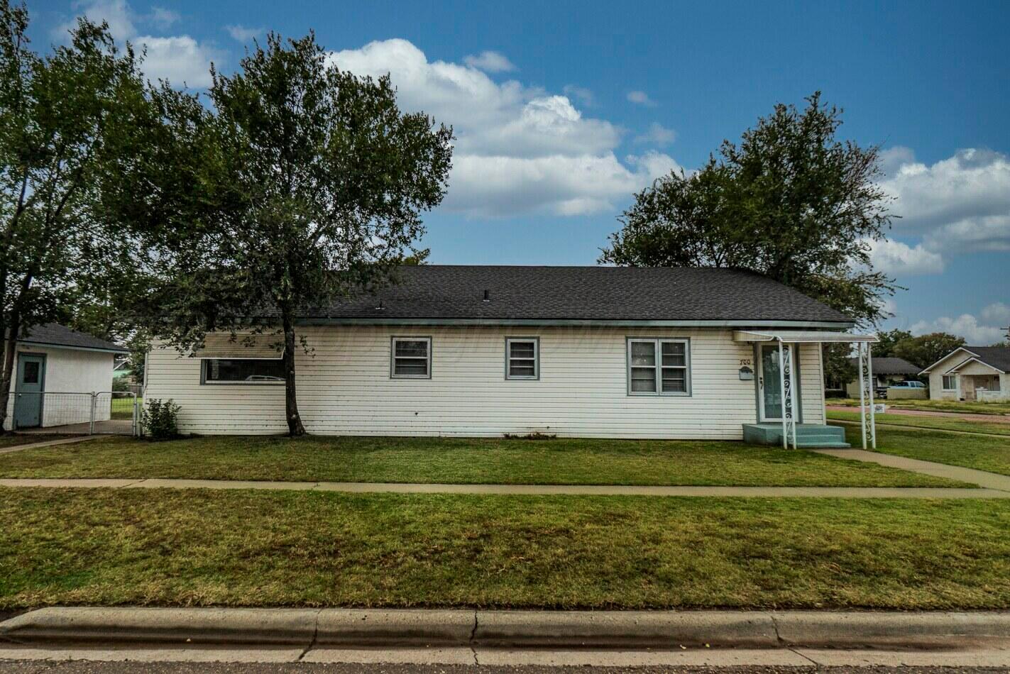 700 21st Street Canyon, TX 79015 - Photo 5 of 30 a front view of a house with a yard