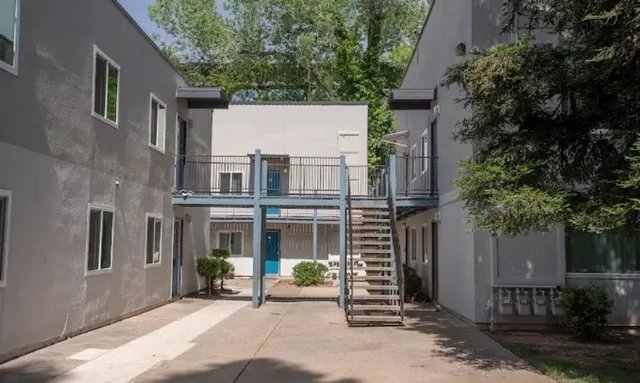 a front view of a house with yard