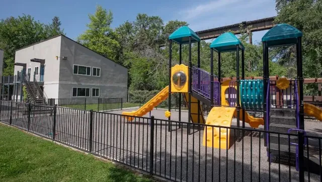 a backyard of a house with seating space